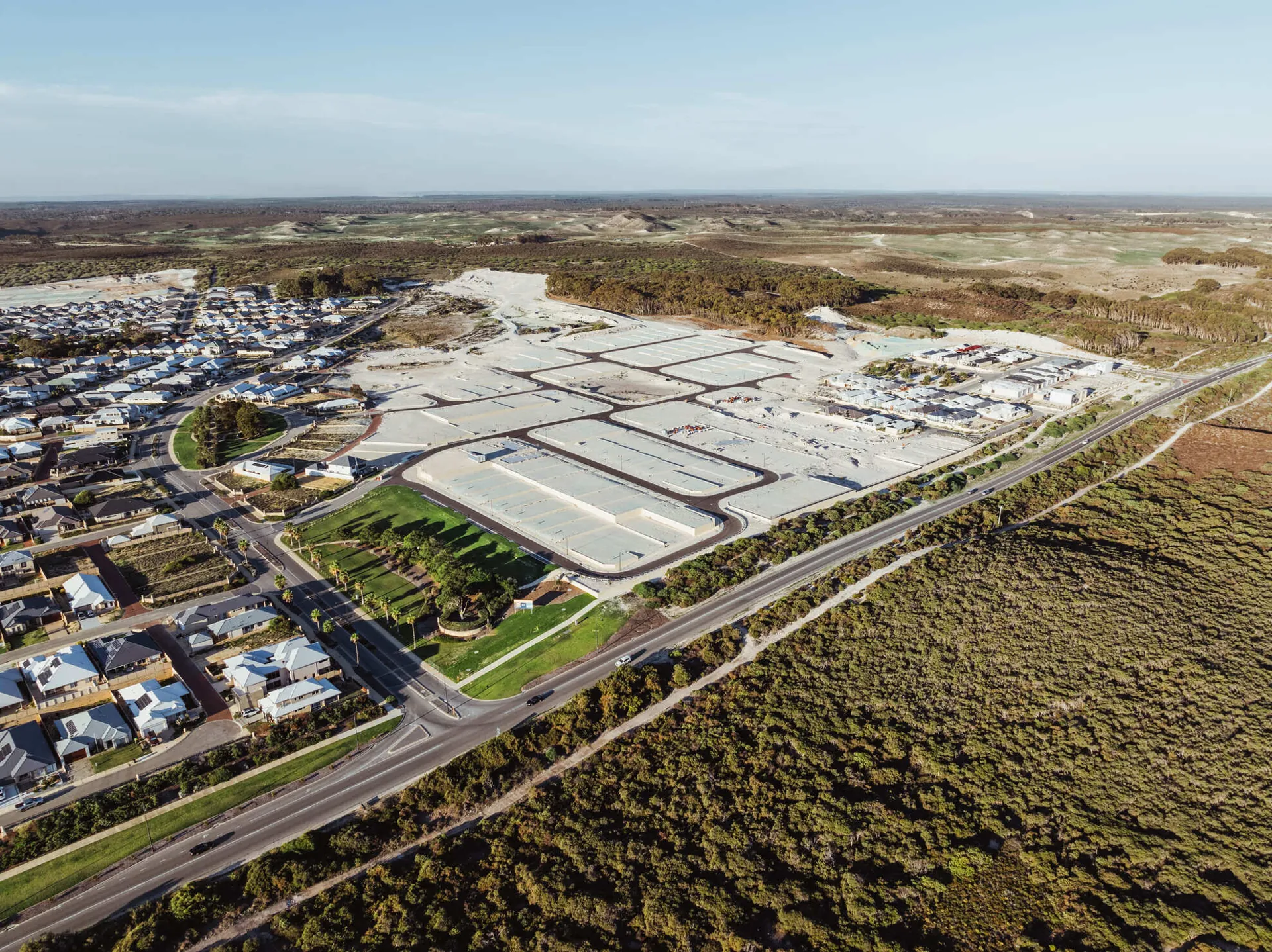 Aerial view of a land subdivision with roads and prepared lots